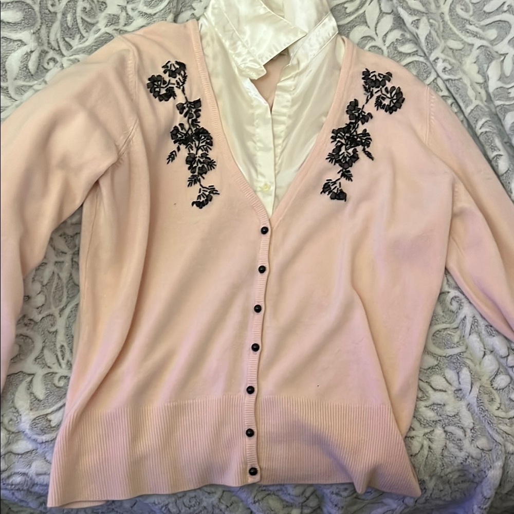 Elegant Pink Sweater with Black Floral Embroidery